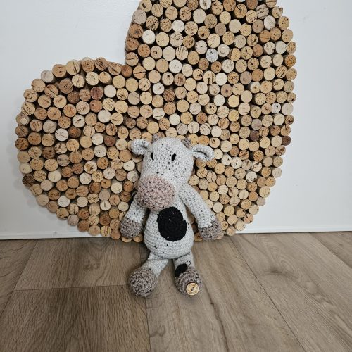 Koe met zwarte vlekken